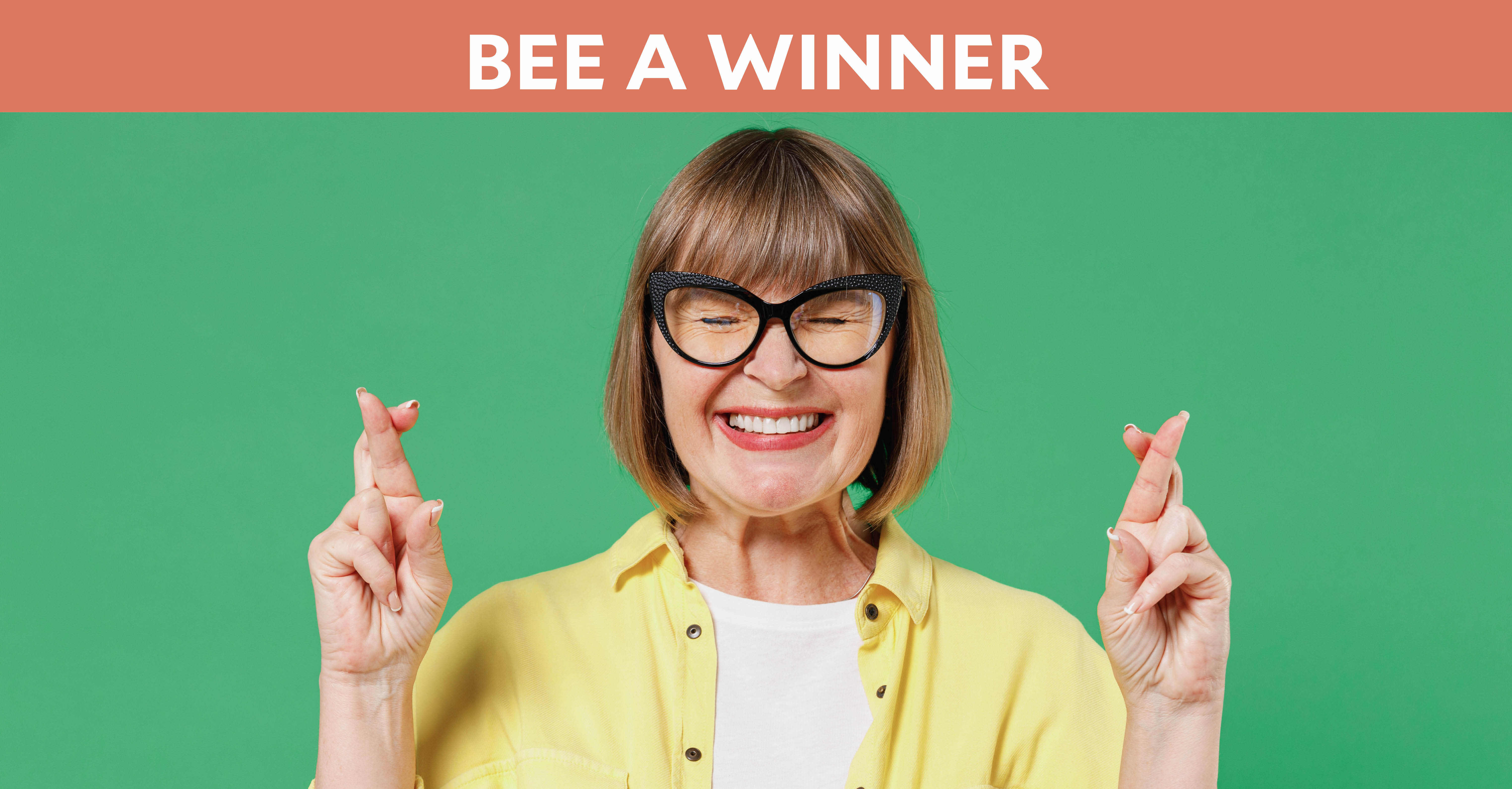 Bee a Winner: Woman with fingers crossed in hopeful excitement
