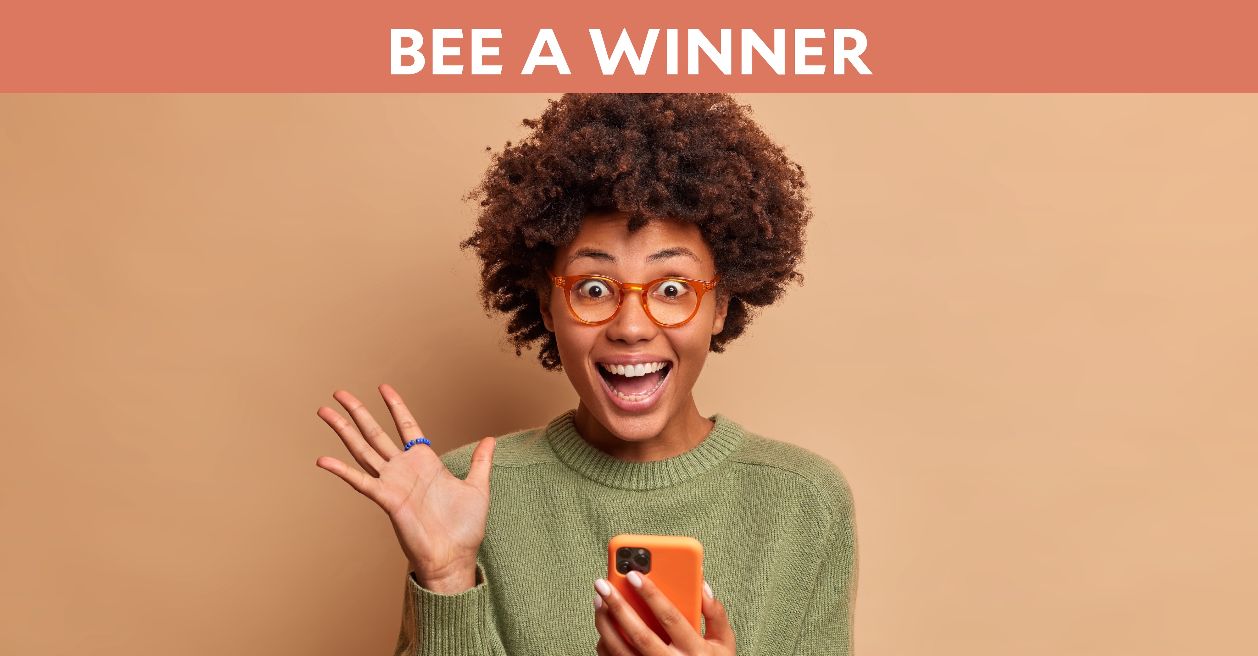Bee a Winner: Woman looking at a smartphone with excited expression