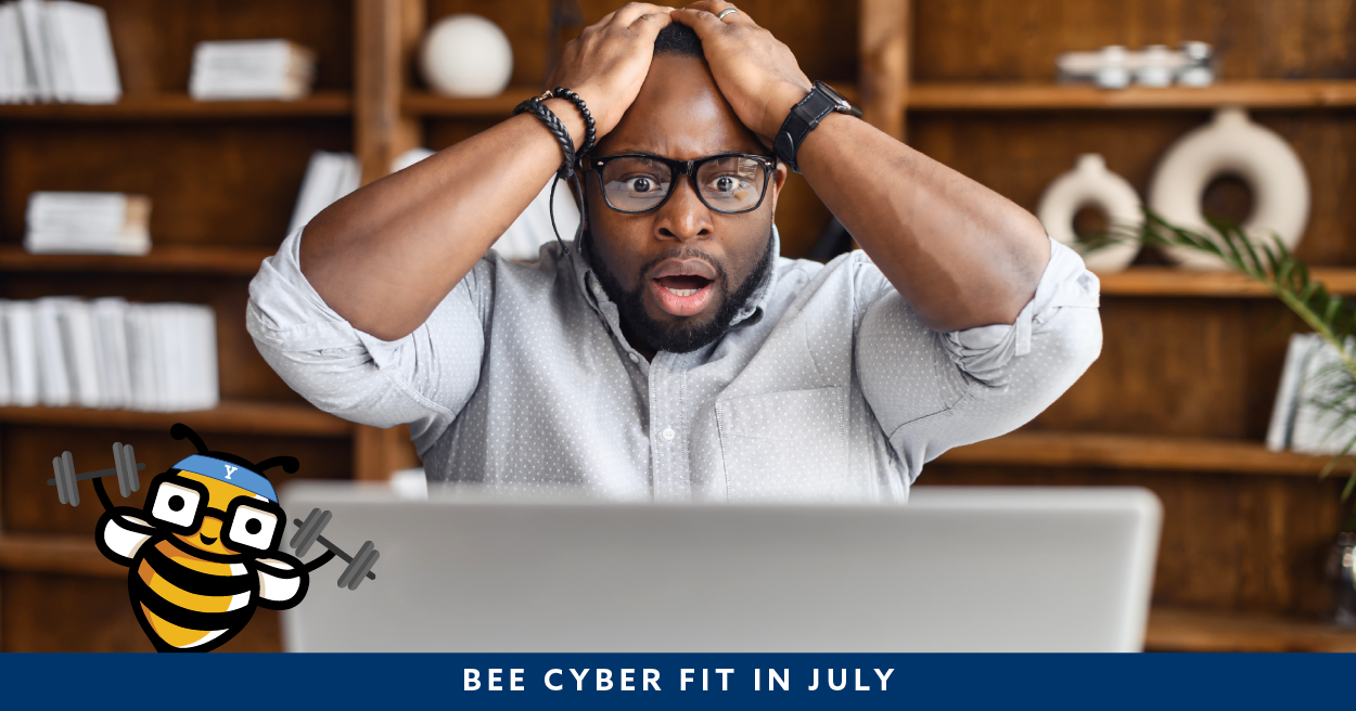 Bee Cyber Fit in July Hero: Man looking at computer with hands on head