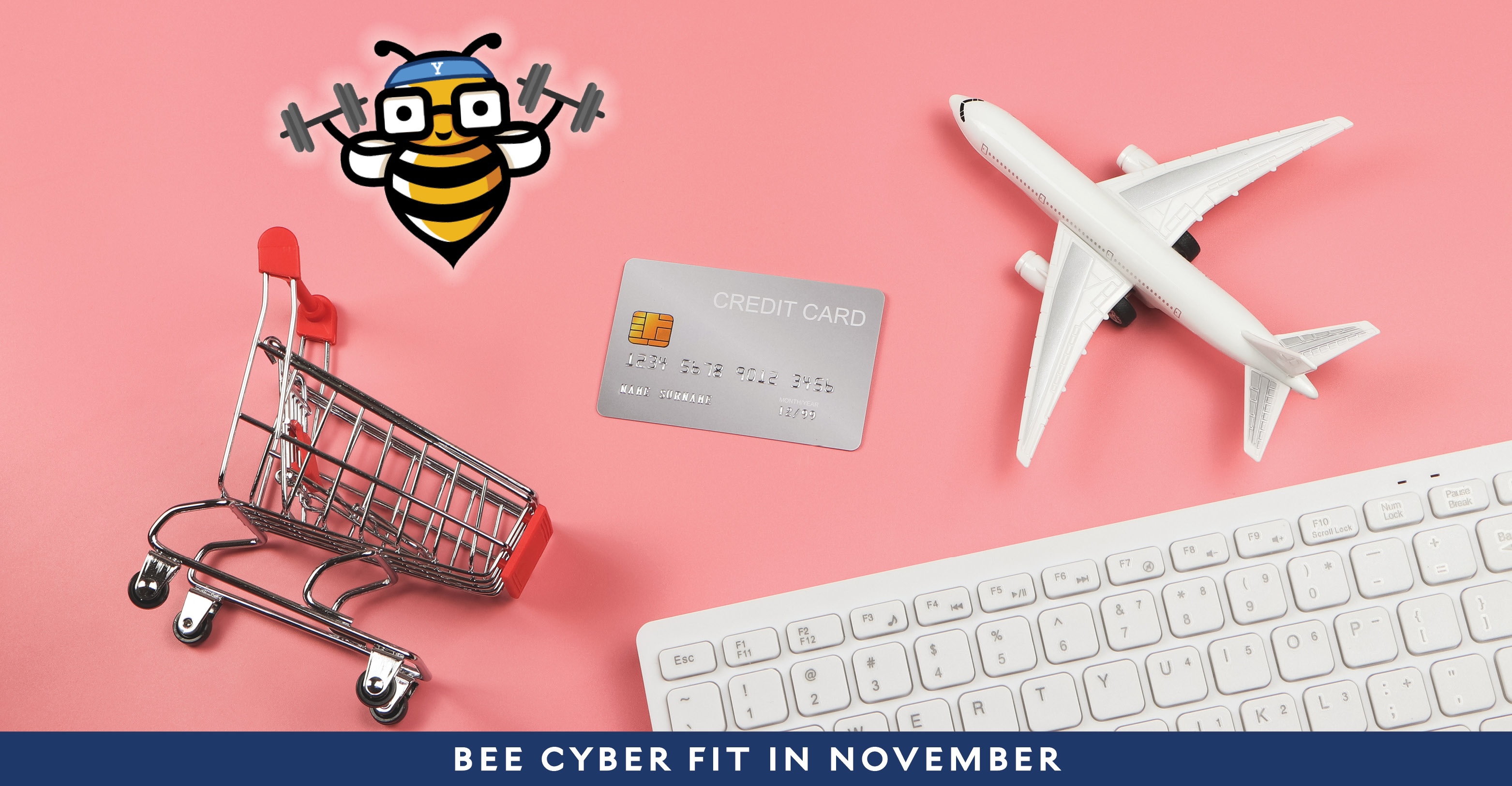 Bee Cyber Fit in November: Keyboard with mini toy airplane and shopping cart and Bee Cyber Fit bee logo