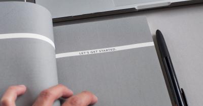 Book with text "Let's get started"