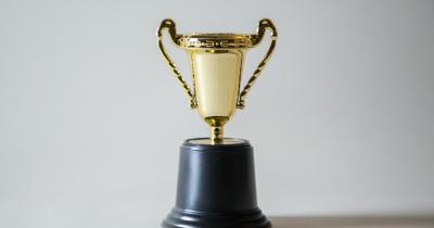 Gold cup shaped trophy