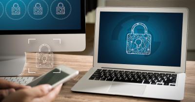 Laptop, screen, and phone with digital padlock