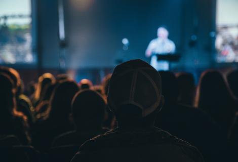 A speaker addressing their audience