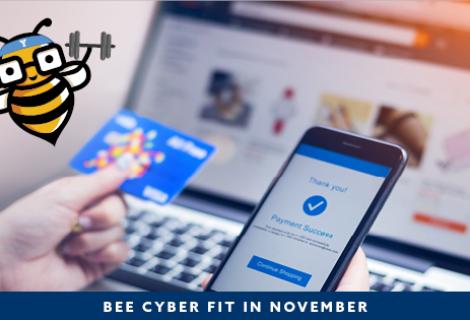 Bee Cyber Fit in November Hero: Laptop and cell phone with credit card and bee cyber fit bee
