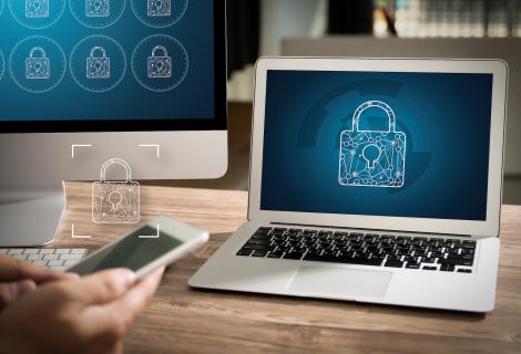 Laptop, screen, and phone with digital padlock
